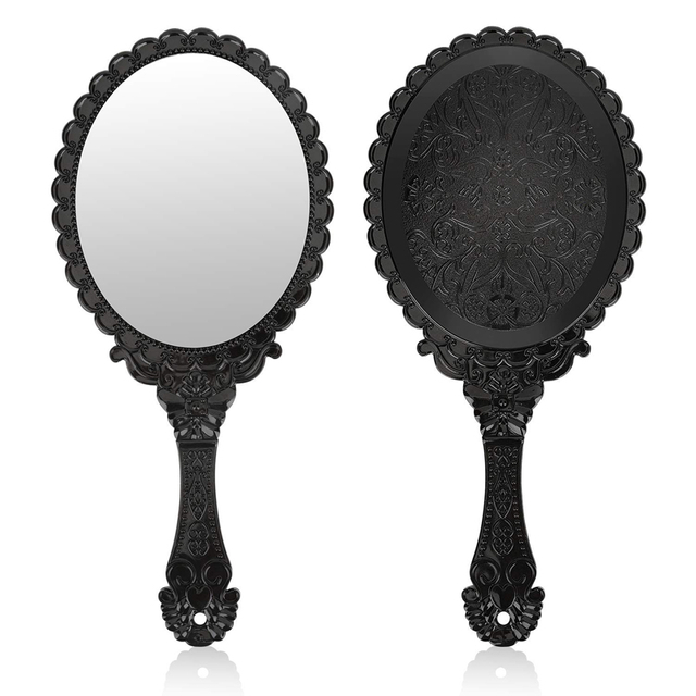 Овальное винтажное черное ручное зеркало