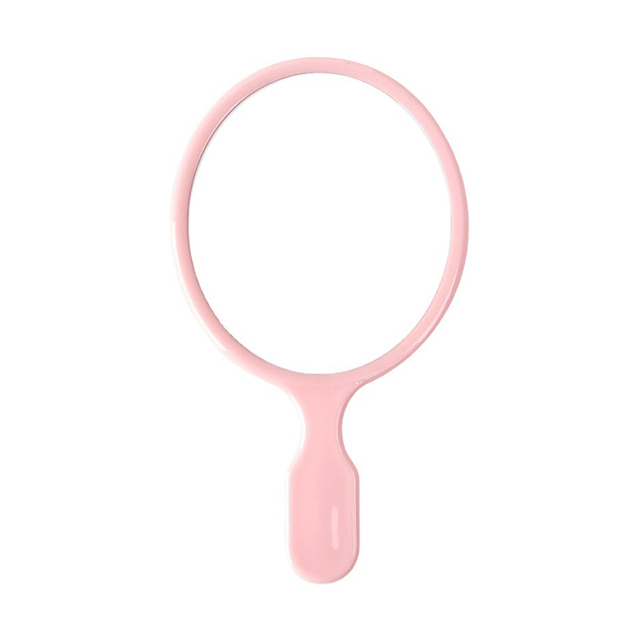 Овальное маленькое розовое ручное зеркало