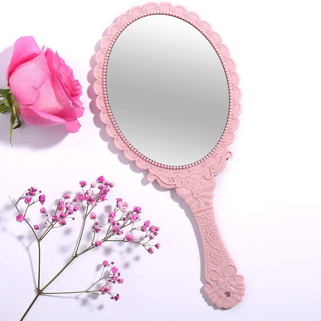 Овальное декоративное розовое ручное зеркало
